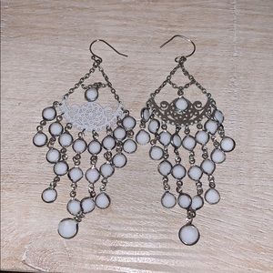 White dangle earrings